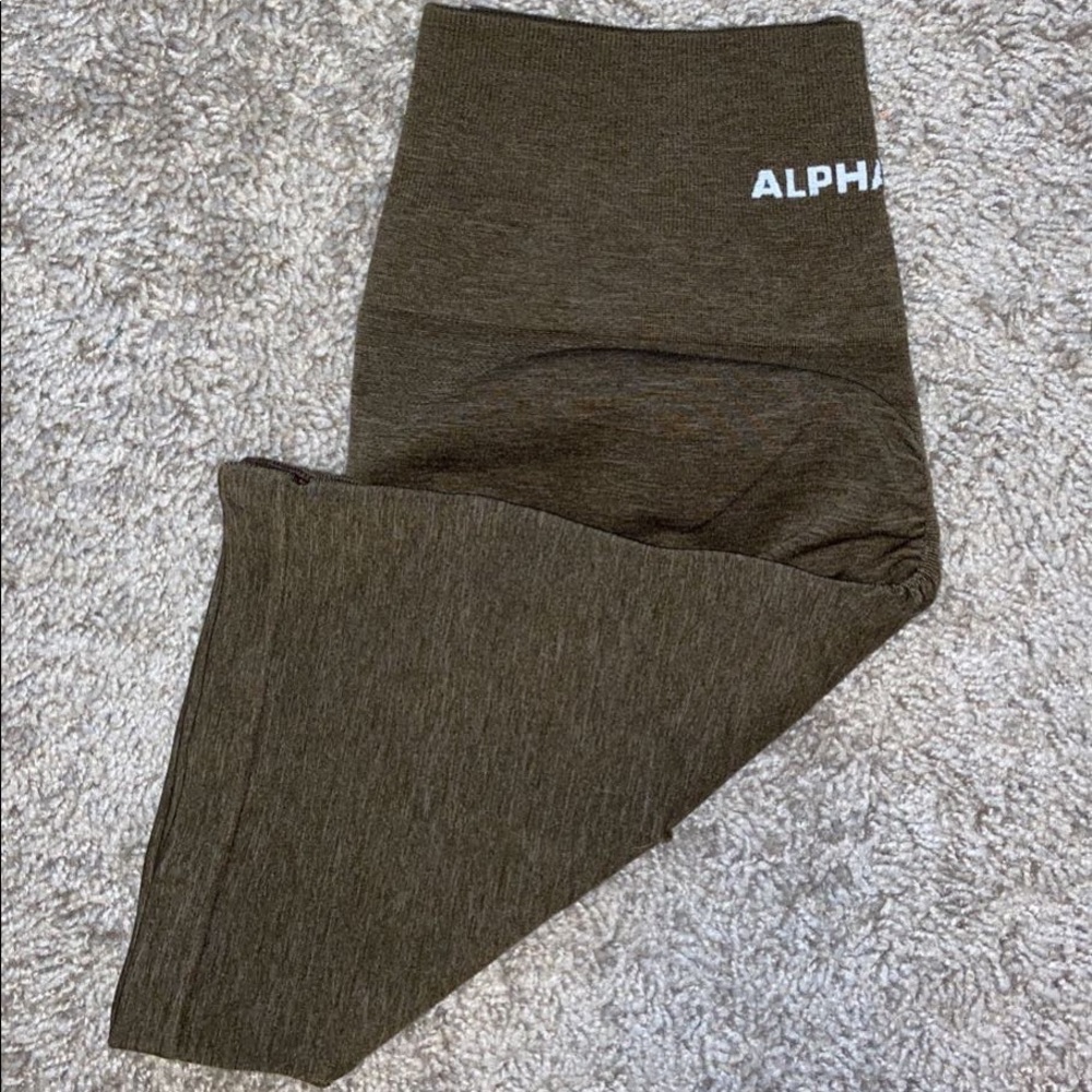 Alphalete Amplify biker shorts. Canteen Green